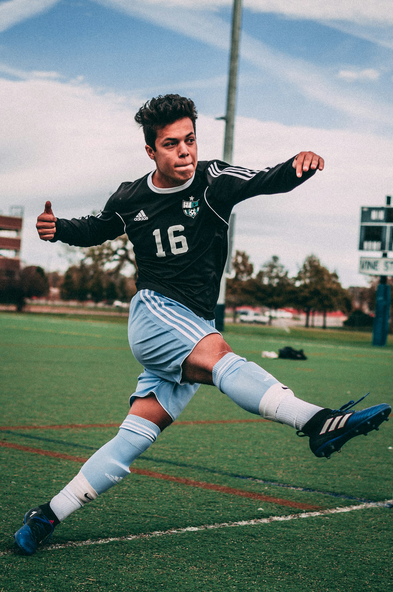 Soccer player leaping to control the ball mid-air