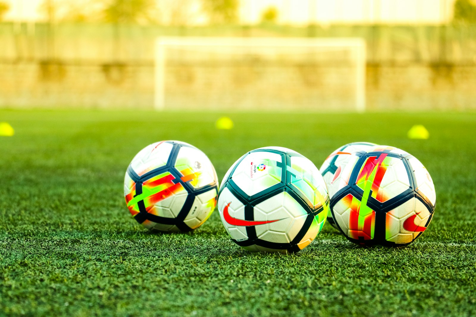 Close-up of a soccer ball on the pitch grass
